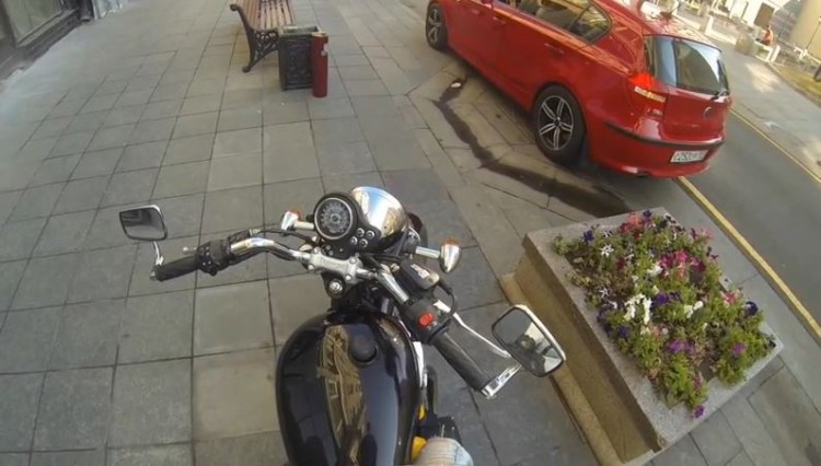 Motorcyclist Takes The Punishment Of Litterers Into Her Own Hands